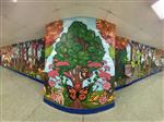 large mural with animals, bugs, trees and plants 