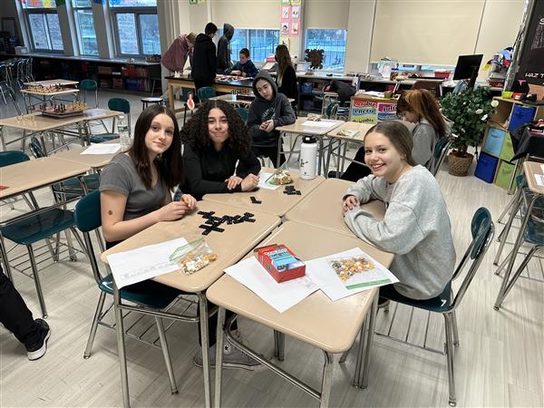  girls sitting at table