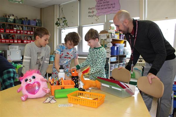 Teacher with 3 students