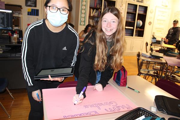  girls smiling over project 