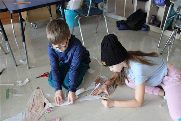  Students creating life-size reindeer