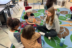  Grade 5 students reading to grade 3 students