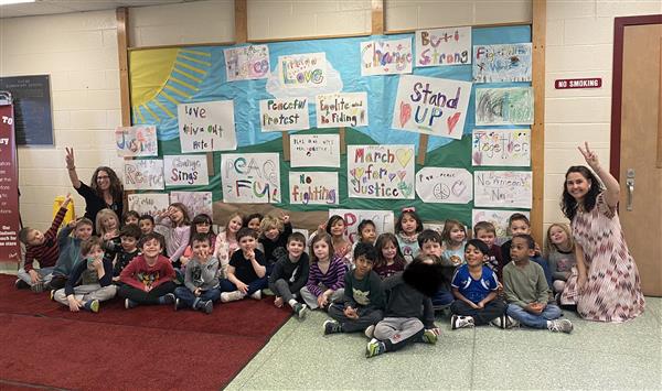  class sitting on floor 
