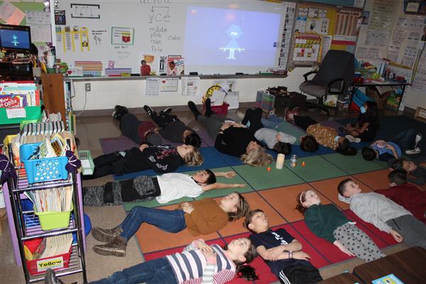  students sleeping on floor 